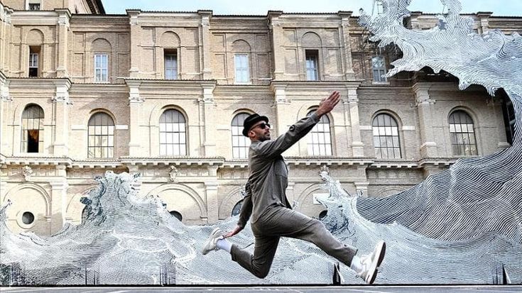 Artist JR: “After us, the flood. That’s why my wave is sweeping across the Vatican”
