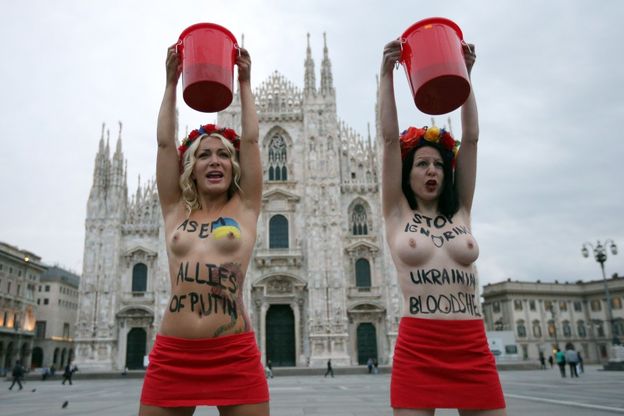 Vertice Asem, blitz Femen in piazza Duomo contro Putin