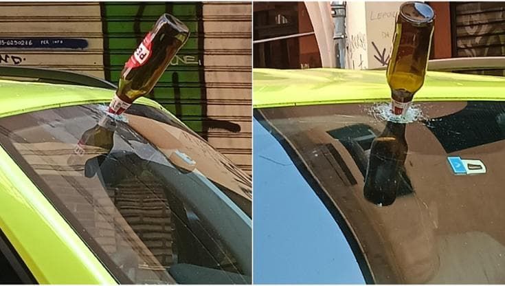 Via Petroni, bottiglia di birra conficcata in un parabrezza nella notte di movida: ira dei residenti