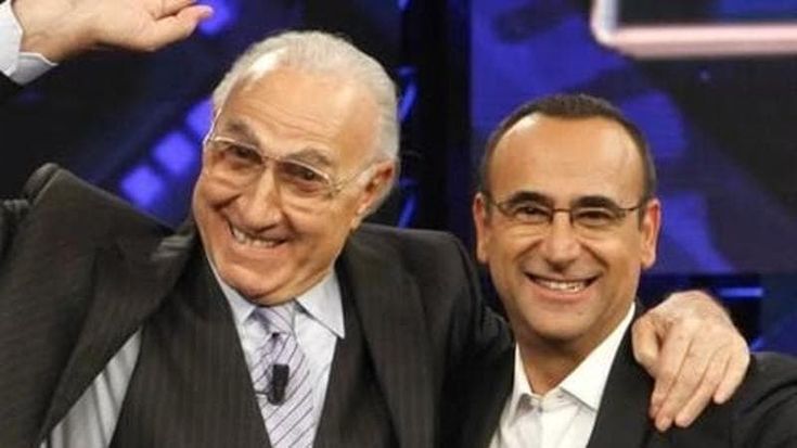 Carlo Conti: “Ricordo gli abbracci di Pippo. E quella volta che mi accolse in boxer”
