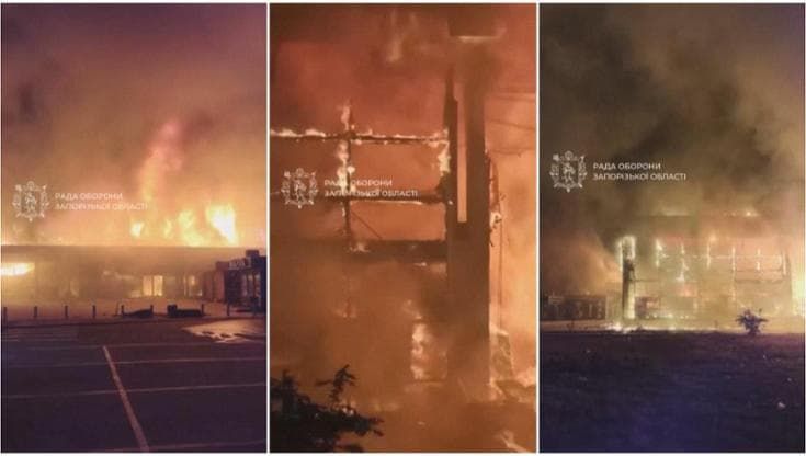 Attacchi russi in Ucraina, centro commerciale distrutto a Zaporizhzhia: l'edificio in fiamme