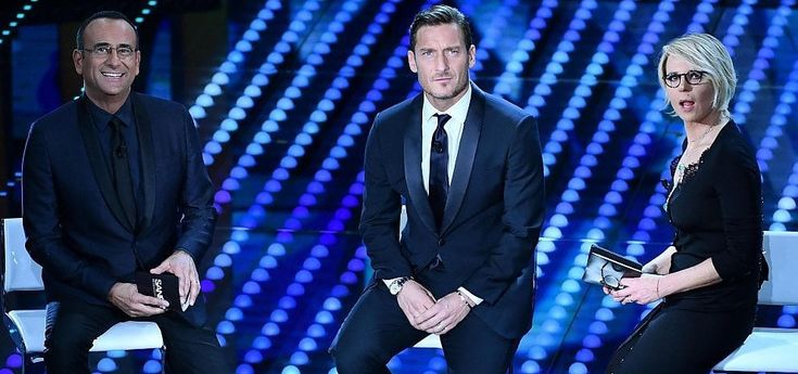 Sanremo, Totti superstar. E Robbie Williams bacia Maria