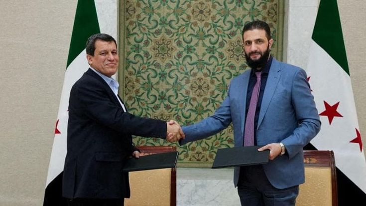 Siria, caccia jihadista agli alawiti. Damasco fa l’accordo con i curdi