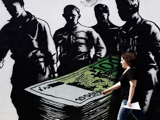 Grecia, i muri di Atene raccontano crisi e austerità