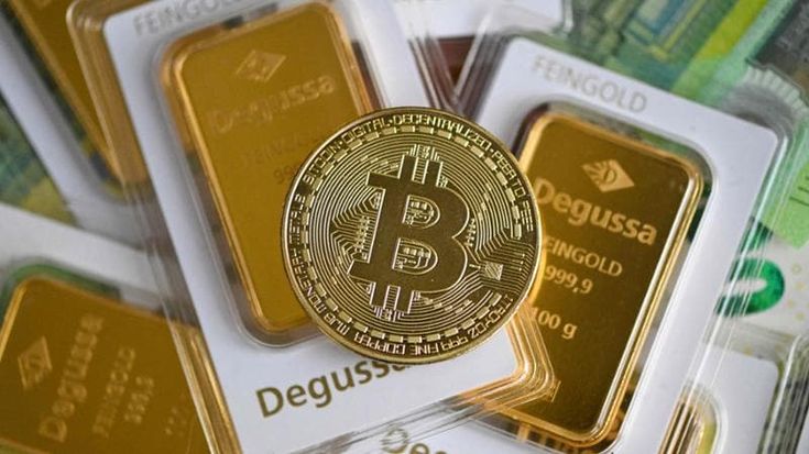 Oro e Bitcoin in crescita, mentre i mercati soffrono. È l’ora di acquistare?