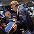 Milano chiude a +0,8% con la Corte tedesca.<br />Il mercato si prepara al tapering Usa