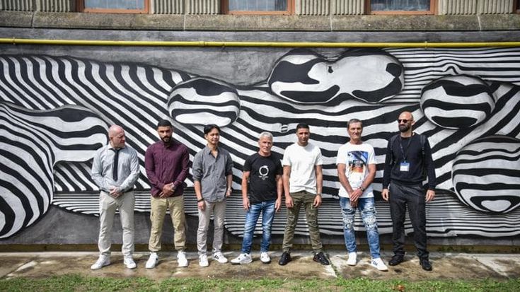Al Carcere di Opera l’arte dietro le sbarre: il murales firmato dai detenuti racconta il loro tempo