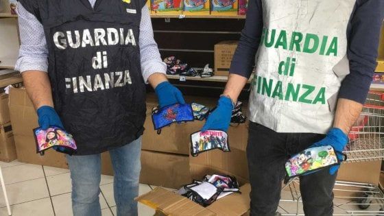 Catania, mascherine contraffatte anche per bambini sequestrate dai finanzieri