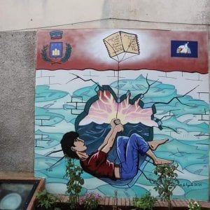 Potenza, a Latronico murales in ricordo del migrante con la pagella 