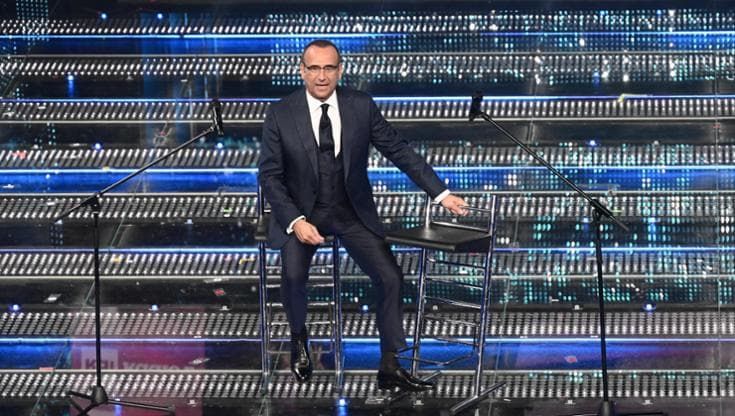 Carlo Conti e Sanremo, le scelte psichedeliche. Gli sconosciuti, i già sentiti e tutti i “figli di”