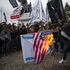 Gerusalemme capitale, bandiere Usa e israeliane in fiamme a Gaza