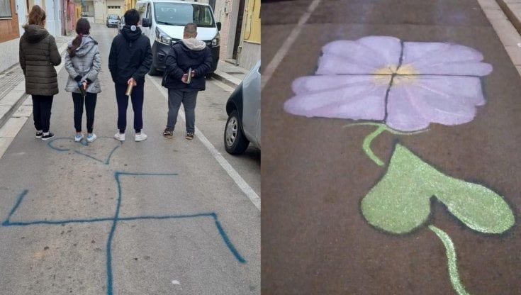 Svastica disegnata in strada, i bambini la coprono con l'immagine di un fiore: "La bellezza ci salverà"