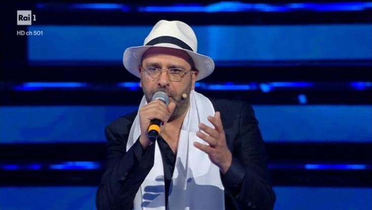 Sanremo 2022, la canzone del virologo Checco Zalone-cugino di Al Bano: "Pandemia ora che vai via"