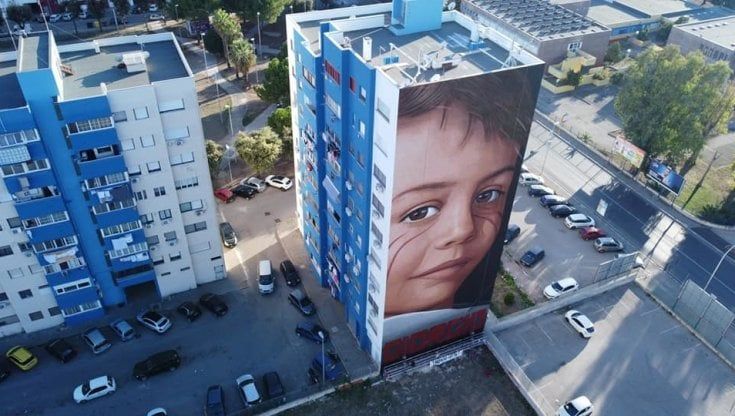 Jorit, il murale a Taranto ha il volto di Giorgio Di Ponzio: il 15enne morto di tumore "simbolo di un'emergenza nazionale"