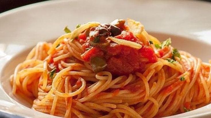 How did pasta alla puttanesca get its name – and how do you make it?