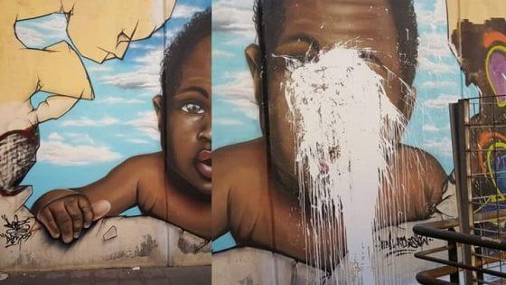 Bari, deturpato il murale del bimbo di colore. I writers autorizzati dal Comune: "Atto di razzismo"