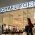 Kors cresce meno delle attese, ma punta su Versace